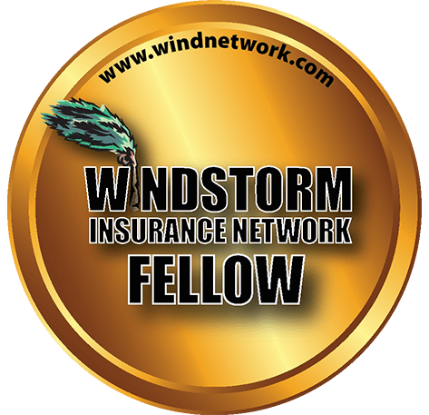 A gold medal with the words windstorm insurance network fellow